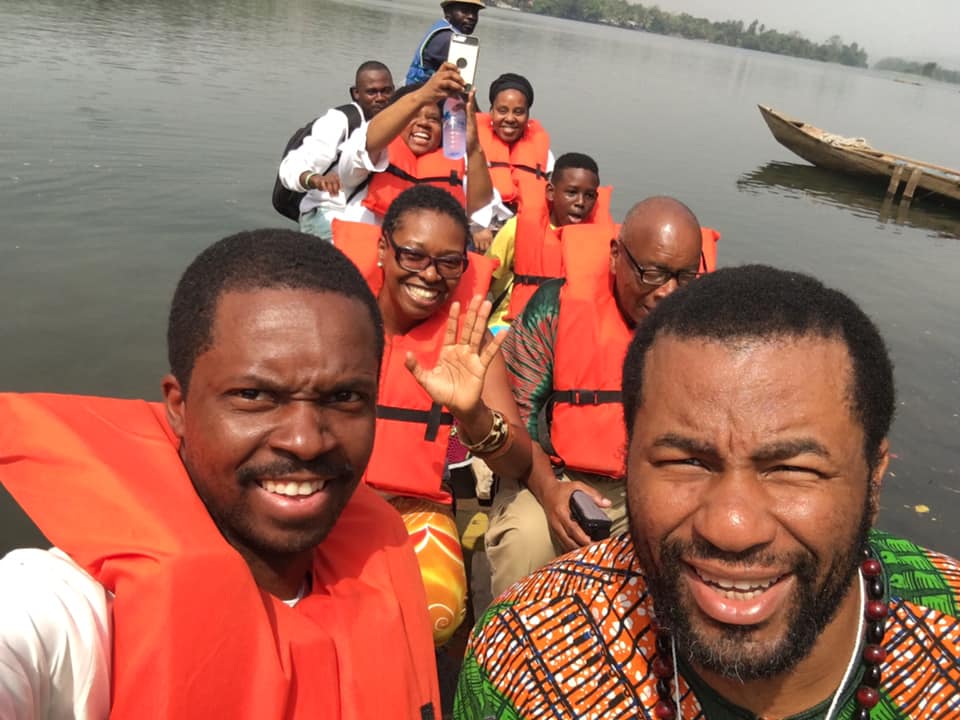 Travelers in a canoe, African Travel